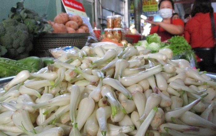 9201c57fec32056c5c23 Người làm hàng Tết 'méo mặt' với giá củ kiệu 2